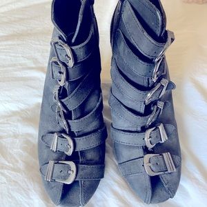 Black platform wedges with combat style buckles